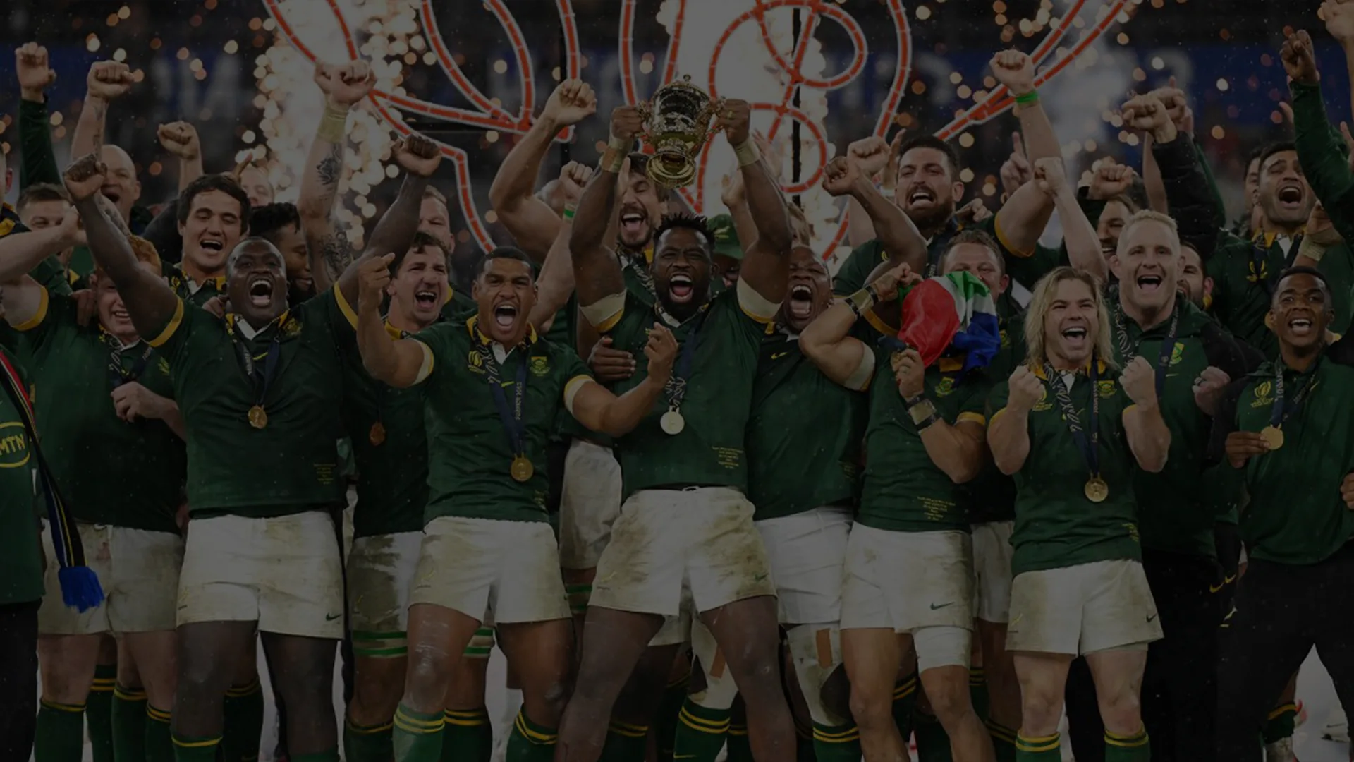 Captain Siya Kolisi and the Springbok Team lifting the Webb Ellis Cup for the 3rd time